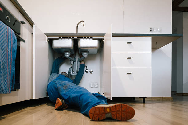 Professional Drain Cleaning technician working in Sayville, NY